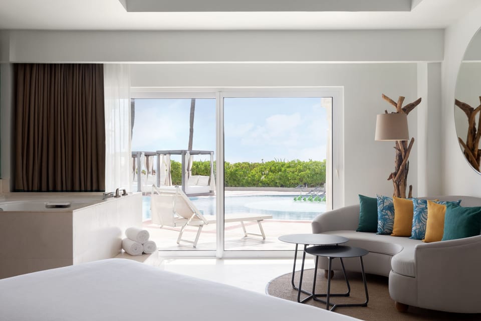 Premium bedding, down comforters, pillowtop beds, free minibar