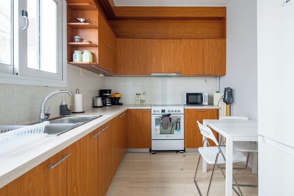 Apartment, 2 Bedrooms, Balcony, City View | Private kitchen | Full-size fridge, microwave, oven, stovetop