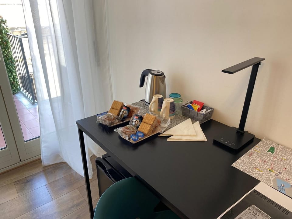 Desk, blackout drapes, WiFi (free), bed sheets