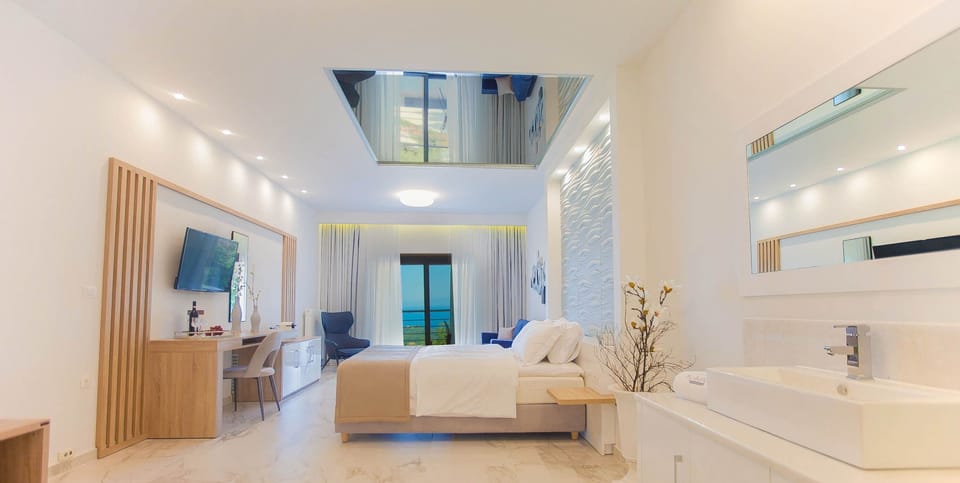 Honeymoon Suite, Sea View | Premium bedding, down comforters, pillowtop beds, in-room safe