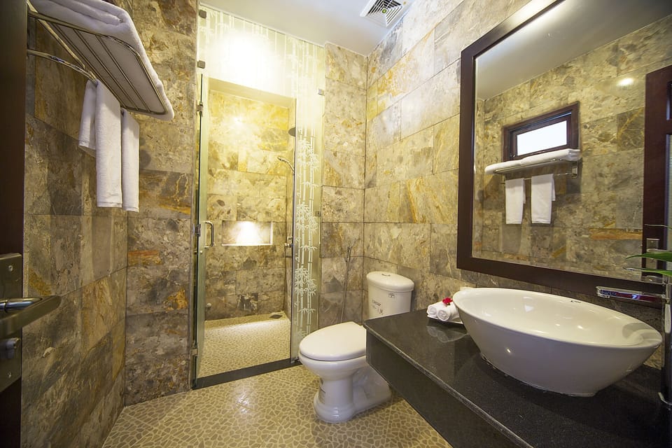 Shower, free toiletries, slippers, towels