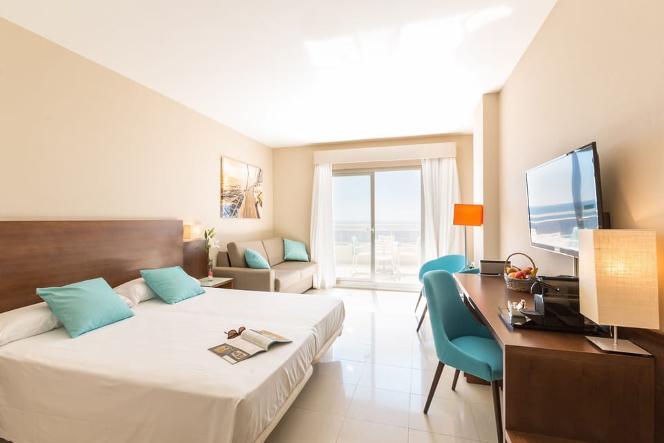 Quadruple Room, Spacious Terrace, Sea View | Minibar, in-room safe, desk, blackout drapes