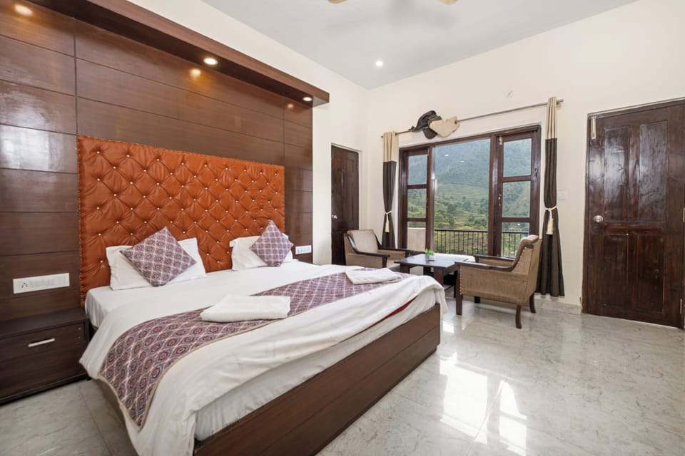 Deluxe Room With Garden View | Premium bedding, desk, laptop workspace, free WiFi