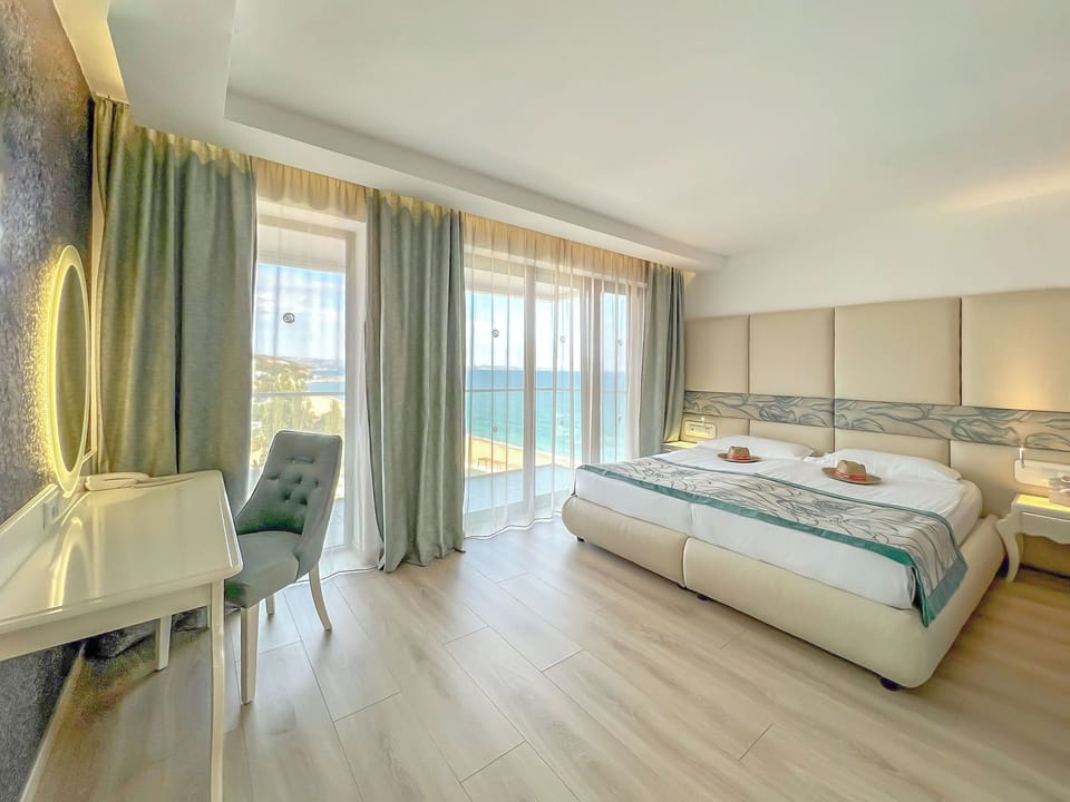 Junior Suite, Side Sea View (Free Beach Access, Safe, Minibar) | Room amenity
