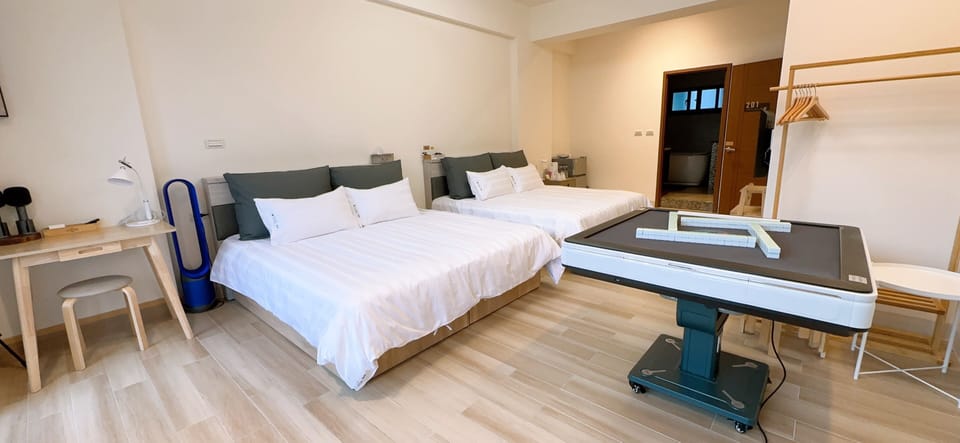 Exclusive Quadruple Room, 2 Queen Beds, Pets Allowed, Park View | Down comforters, free WiFi