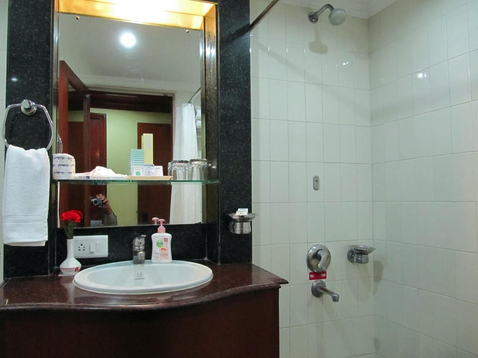 Designer toiletries, bathrobes, slippers, towels