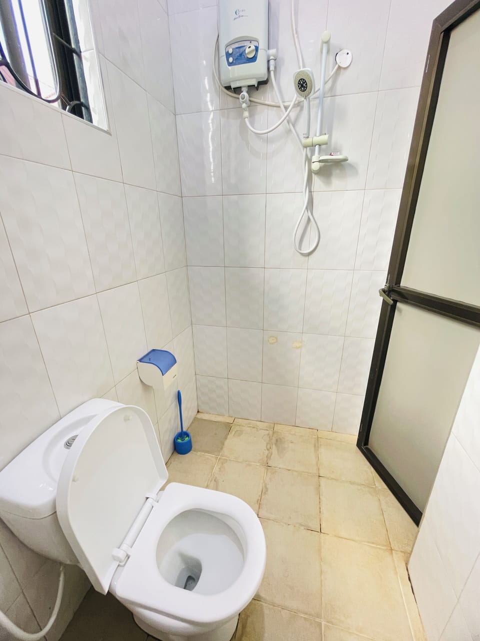 Raised toilet seat