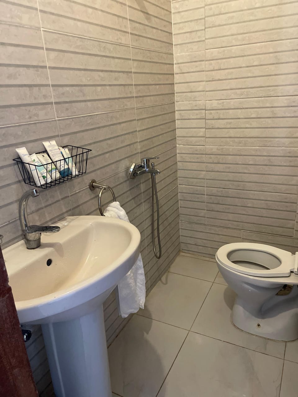 Slippers, towels, soap, toilet paper