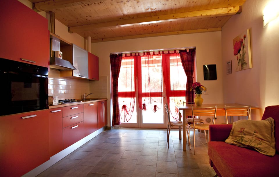 Comfort Apartment, 2 Bedrooms, Kitchen, Beach View | Living room | 18-inch flat-screen TV with digital channels, LCD TV
