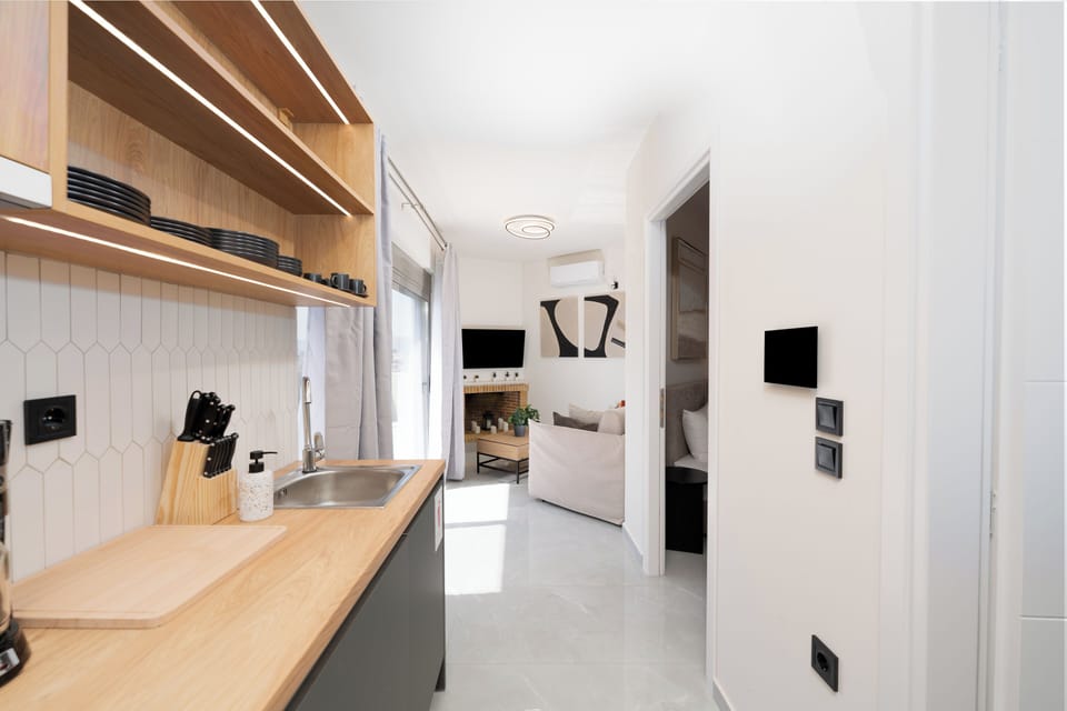 Panoramic Apartment, City View | Private kitchen | Mini-fridge, microwave, stovetop, espresso maker