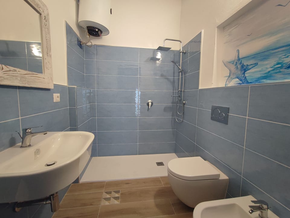 Shower, towels, soap, shampoo