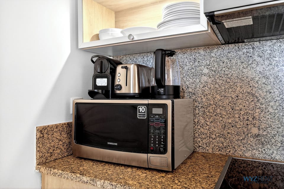 Standard Apartment, Beach View | Private kitchen | Full-size fridge, microwave, oven, stovetop