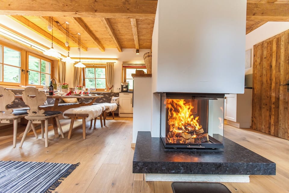 Comfort Chalet, 4 Bedrooms, Terrace, Mountain View | Living area | 50-inch flat-screen TV with cable channels
