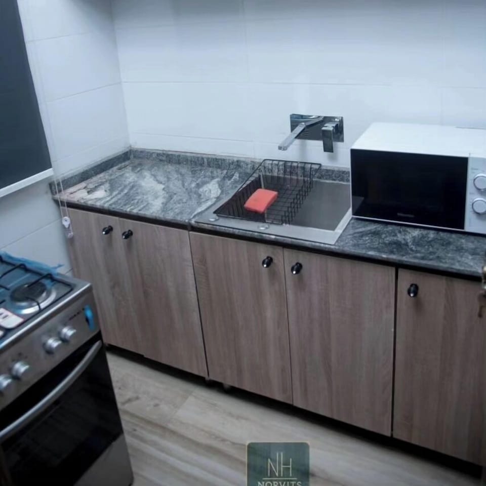 Economy Room, Balcony, City View | Private kitchen | Fridge