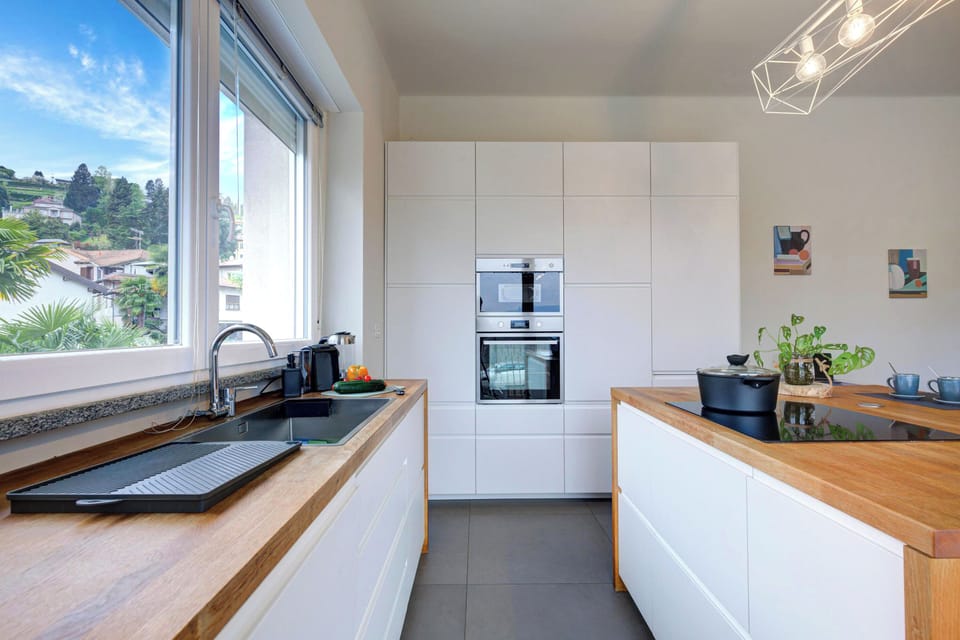 Family Apartment, 2 Bedrooms, 2 Bathrooms, Lakeside (Suono del Lago 100m from Lake) | Private kitchen
