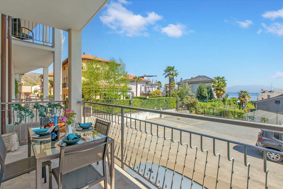 Family Apartment, 2 Bedrooms, 2 Bathrooms, Lakeside (Suono del Lago, AC 50 mt  from Lake) | Outdoor dining