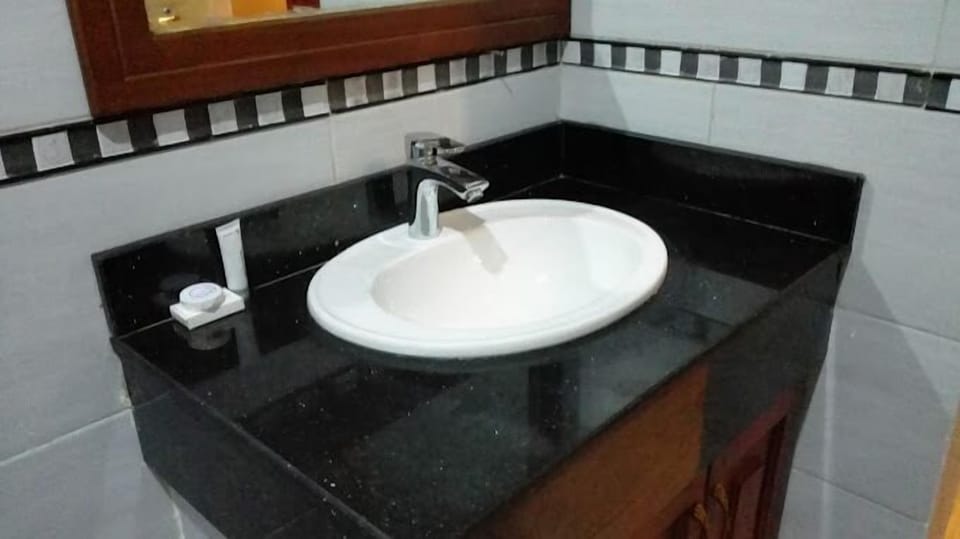 Shower, slippers, towels, soap