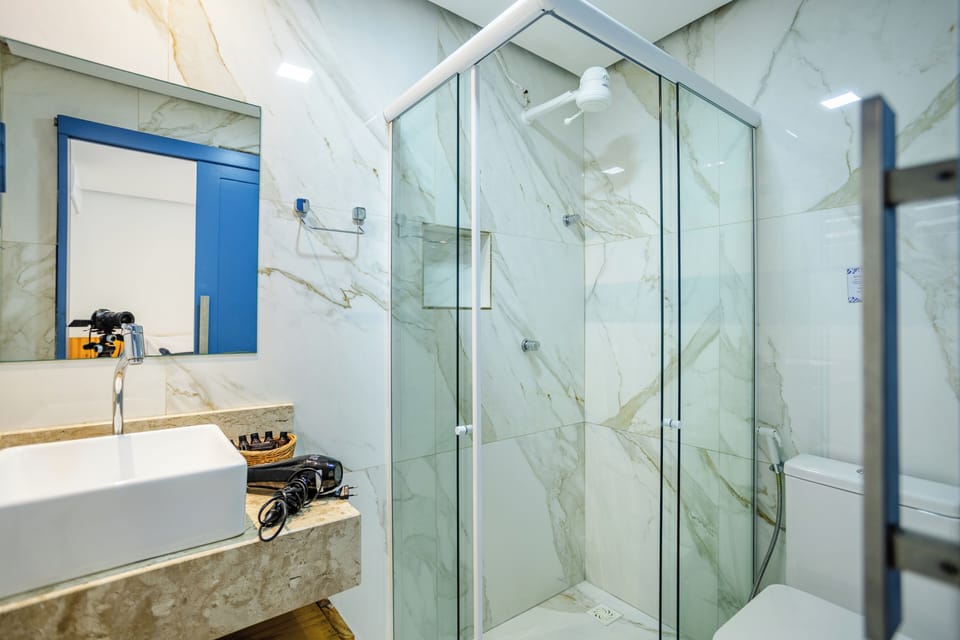 Standard Quadruple Room, Multiple Beds, Kitchen | Bathroom | Hair dryer, towels, soap, shampoo