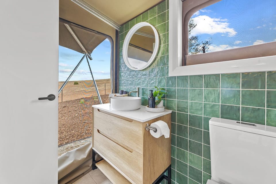 Separate tub and shower, free toiletries, hair dryer, slippers
