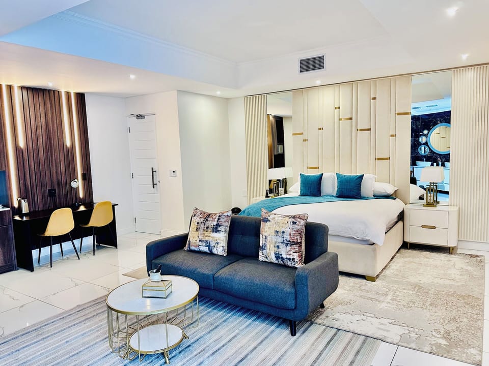 Exclusive Suite, Garden View | Desk, laptop workspace, iron/ironing board, free WiFi