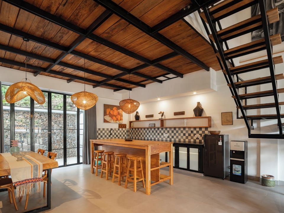 Two Bedroom Loft with a Fully Equipped Kitchenette | Private kitchen | Cleaning supplies, freezer