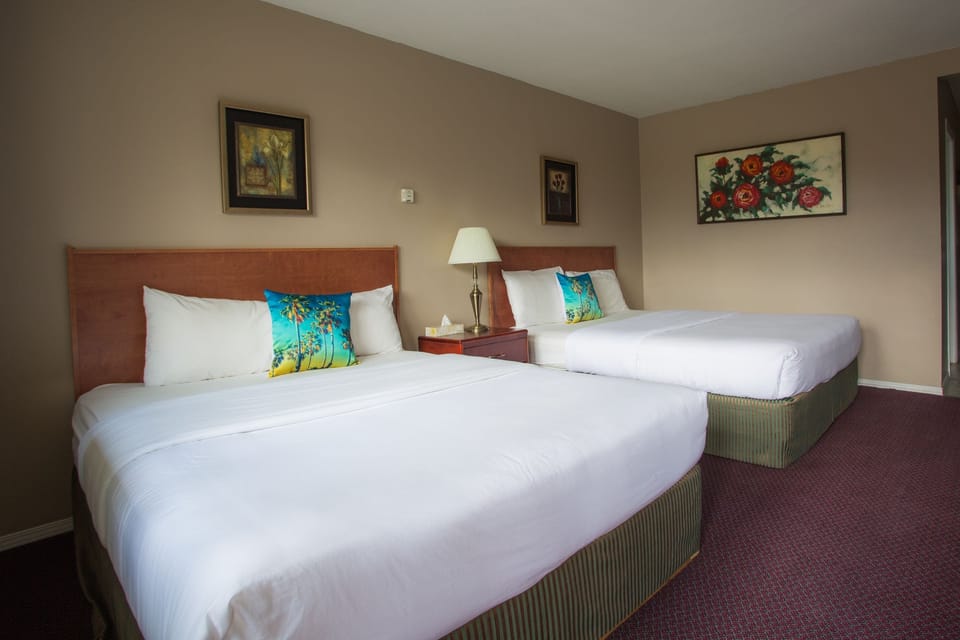 Room, 2 Queen Beds | In-room safe, desk, blackout drapes, iron/ironing board (on request)