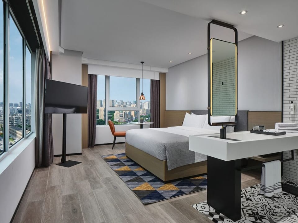 Superior Single Room, City View | Premium bedding, down comforters, blackout drapes, iron/ironing board