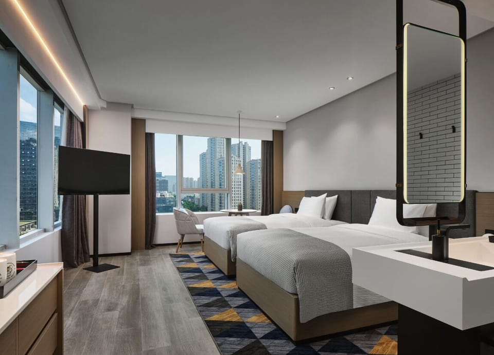 Superior Twin Room, Multiple Beds, City View | Premium bedding, down comforters, blackout drapes, iron/ironing board
