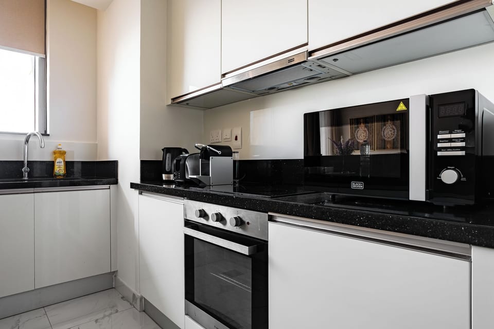 Premium Apartment, 2 Bedrooms, Canal View | Private kitchen | Full-size fridge, microwave, oven, stovetop