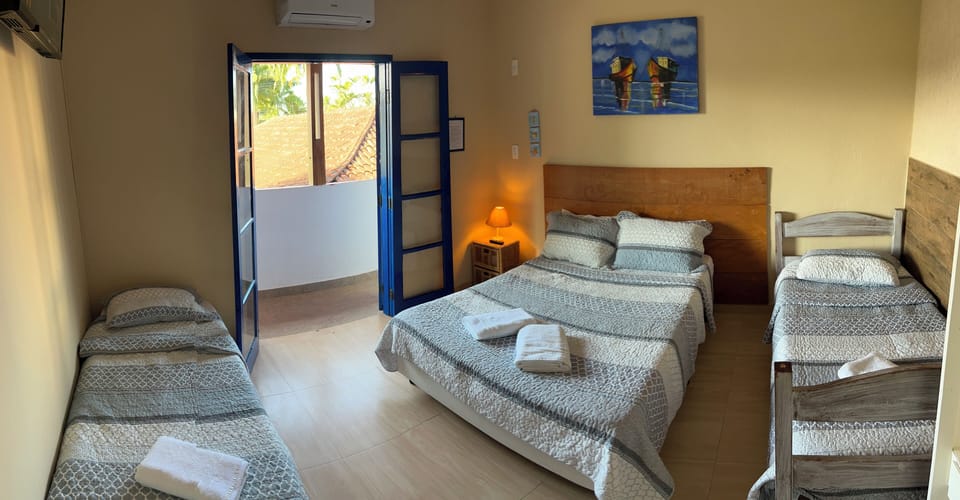 Deluxe Quadruple Room | Minibar, individually decorated, free WiFi, bed sheets