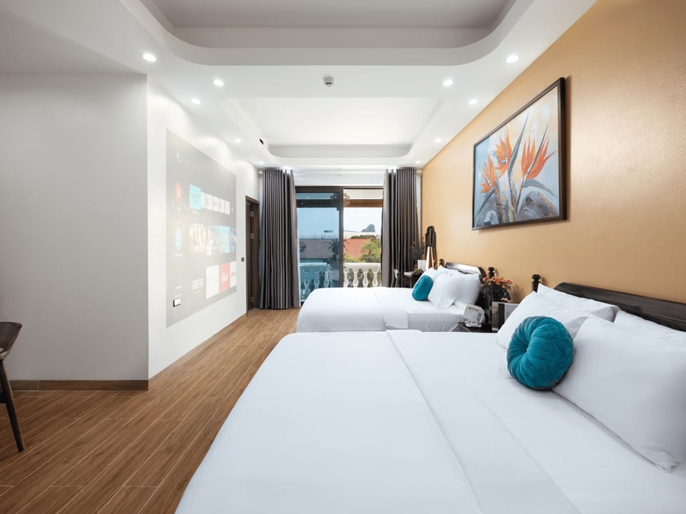 Premium Quadruple Room, Balcony, Mountain View | Minibar, laptop workspace, blackout drapes, soundproofing
