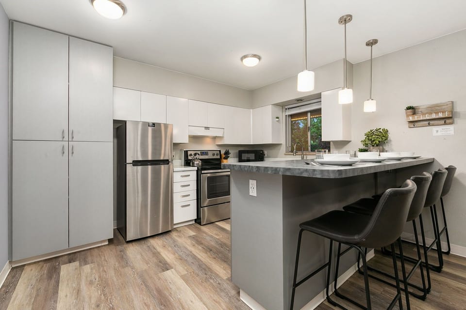 Condo, Multiple Beds, Patio, Garden View (220 Peterson St. (Unit 3,4,7,8)) | Private kitchen | Fridge, microwave, oven, stovetop