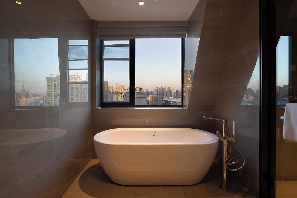 Signature Studio Suite | Bathroom | Free toiletries, hair dryer, bathrobes, slippers