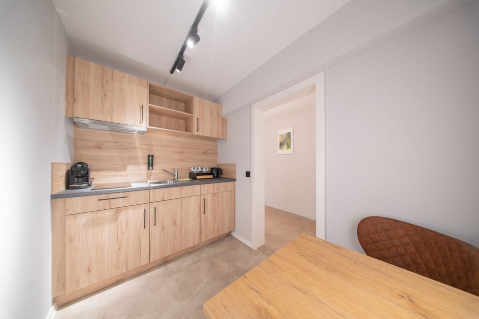 Family Apartment | Private kitchen | Highchair, eco-friendly cleaning products