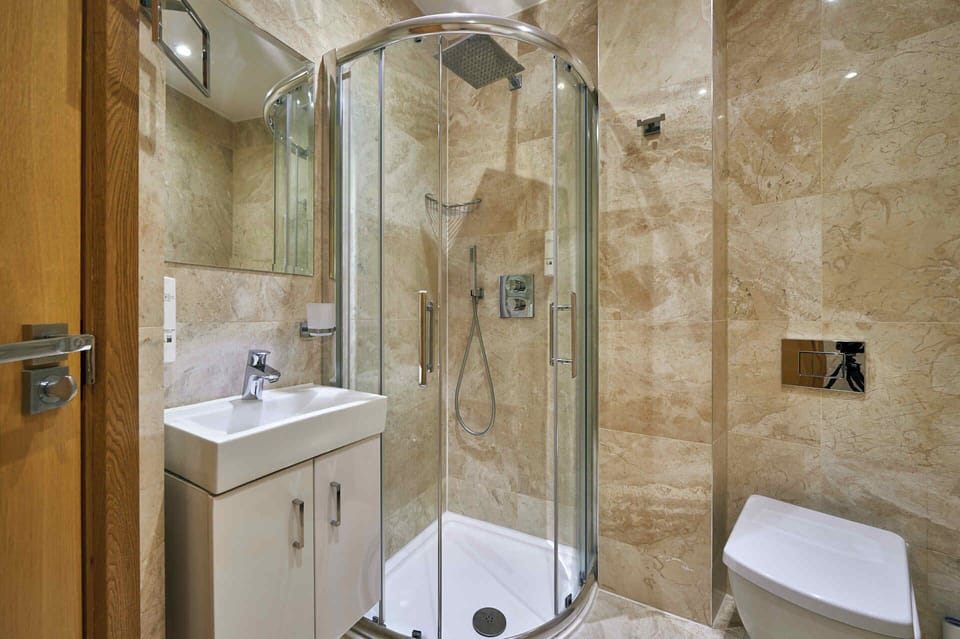 Double Room | Bathroom | Shower, hair dryer, towels, soap