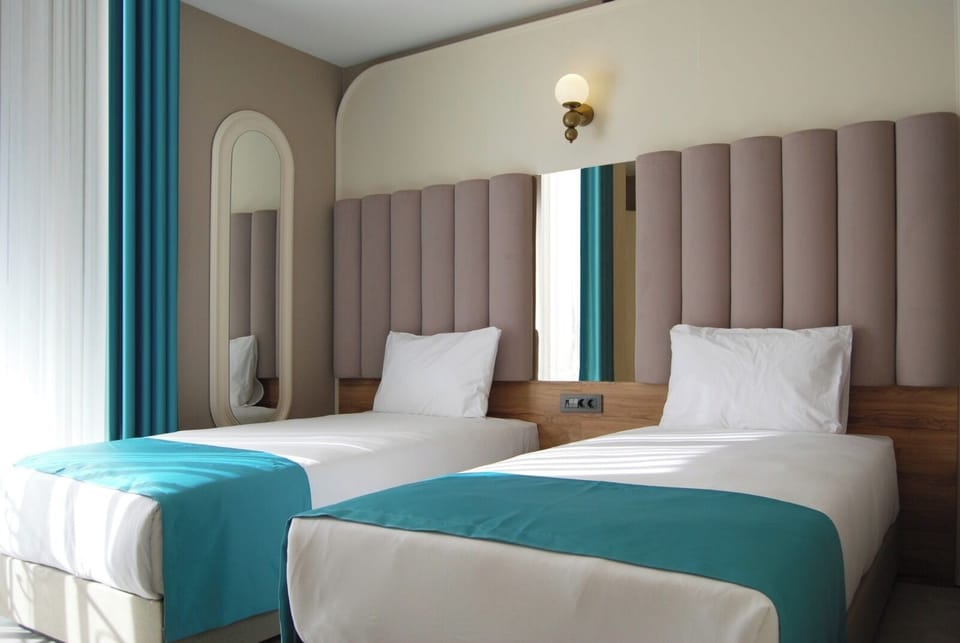 Standard Twin Room, City View | Hypo-allergenic bedding, minibar, soundproofing, free WiFi