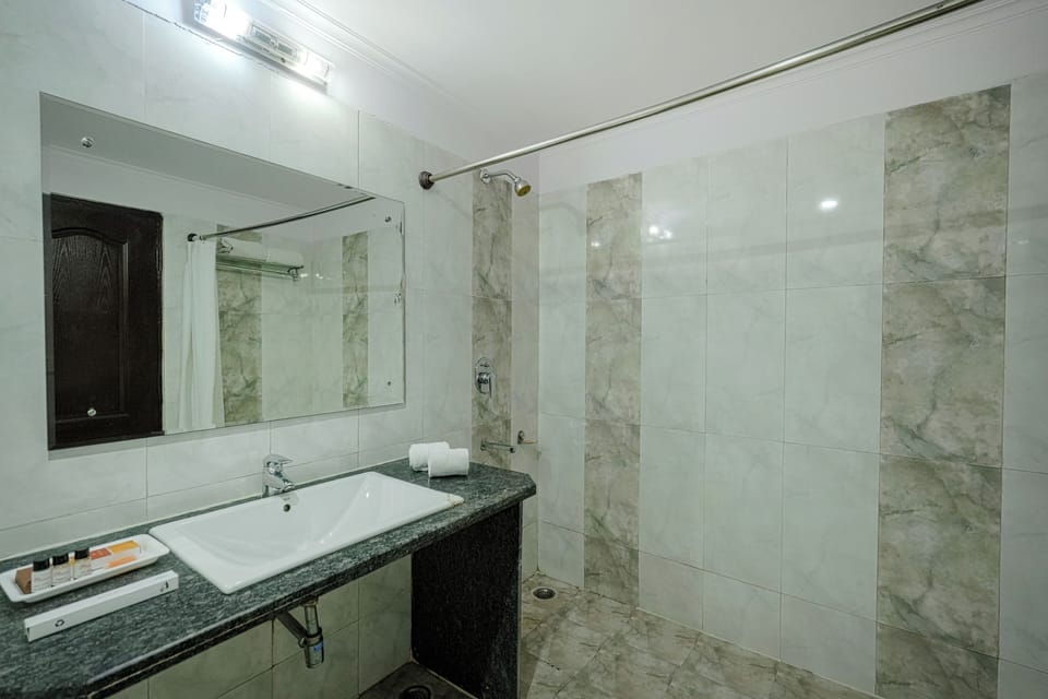 Family Room, Hill View | Bathroom | Shower, slippers, towels, soap