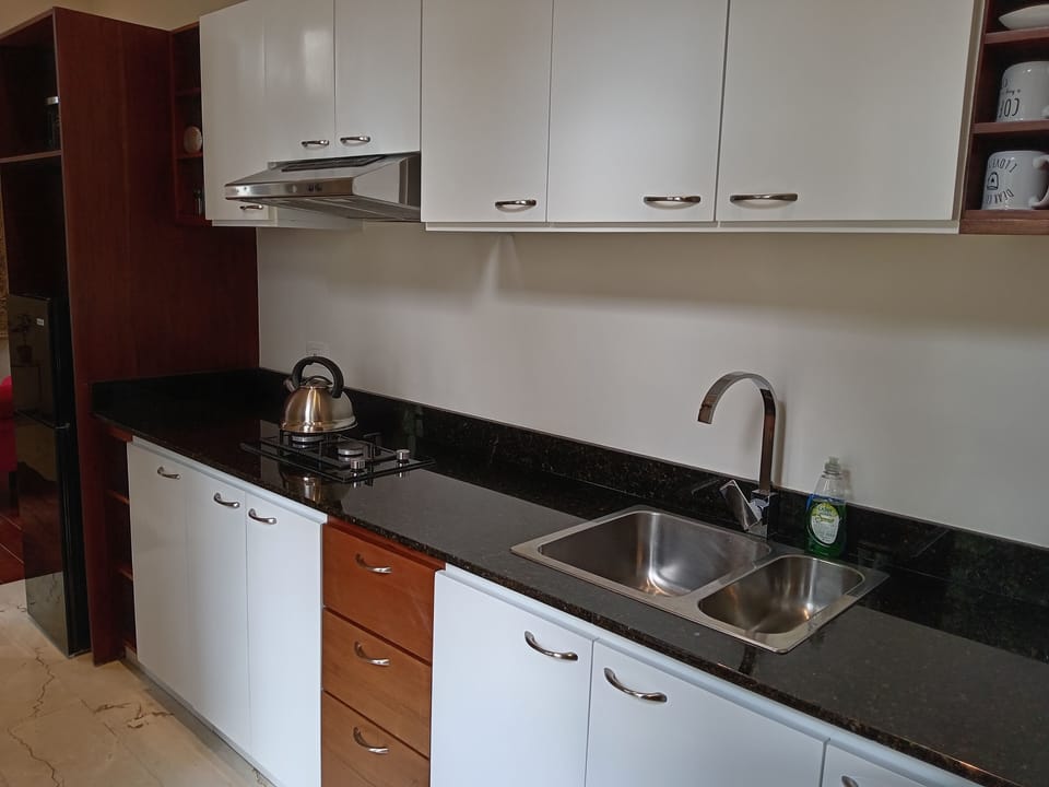 Superior Suite, Kitchen, Pool View | Private kitchen