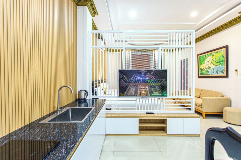 Family Apartment, City View | In-room safe, desk, laptop workspace, blackout drapes