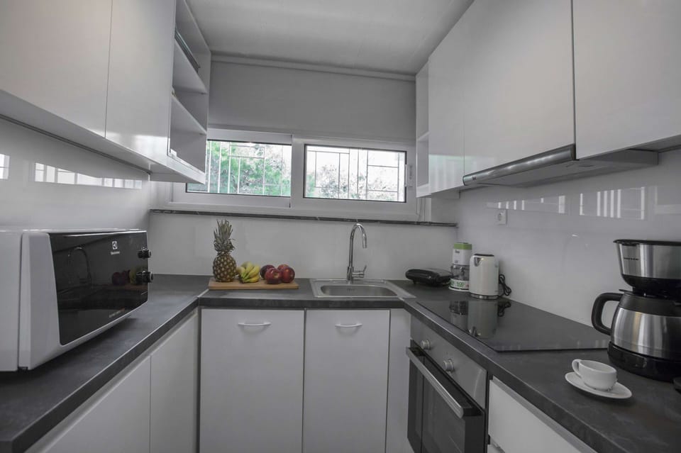 Comfort Apartment, 2 Bedrooms, Sea View | Private kitchen | Full-size fridge, oven, stovetop, coffee/tea maker