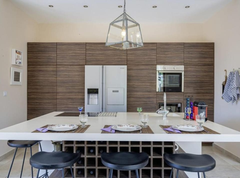 Villa (Poolside Grand Retreat Villa) | Private kitchen | Fridge