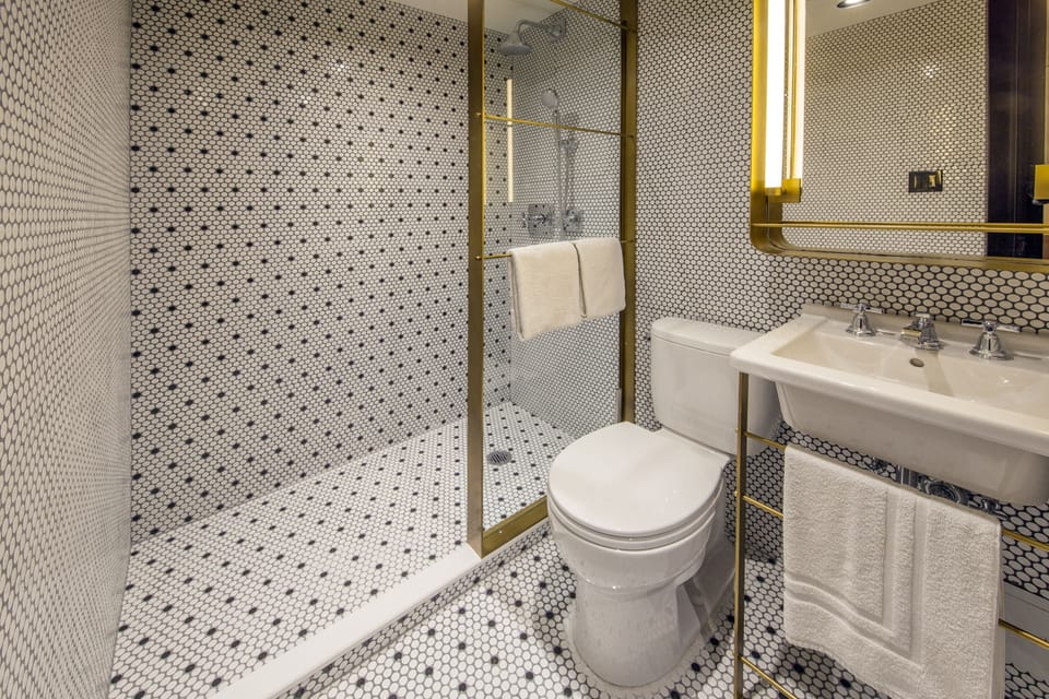 Rainfall showerhead, designer toiletries