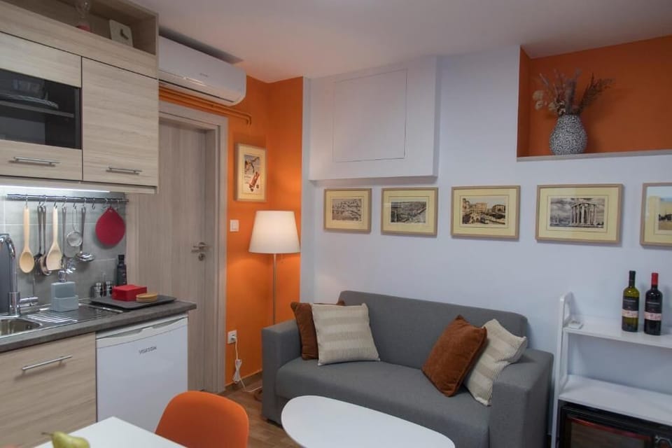 Economy Apartment, 1 Bedroom, Kitchenette | Living area | 43-inch flat-screen TV with digital channels