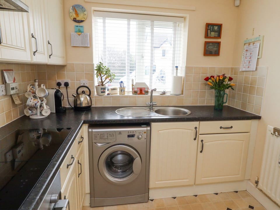 Fridge, microwave, cookware/dishes/utensils