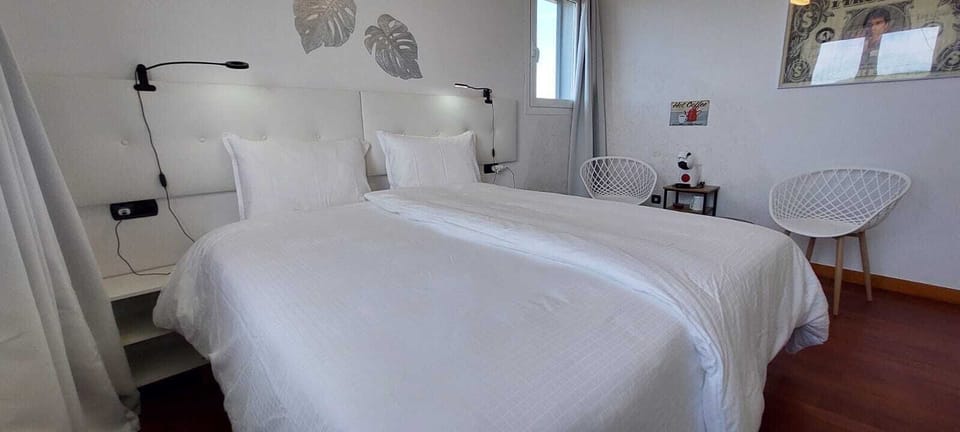 Premium bedding, in-room safe, soundproofing, iron/ironing board