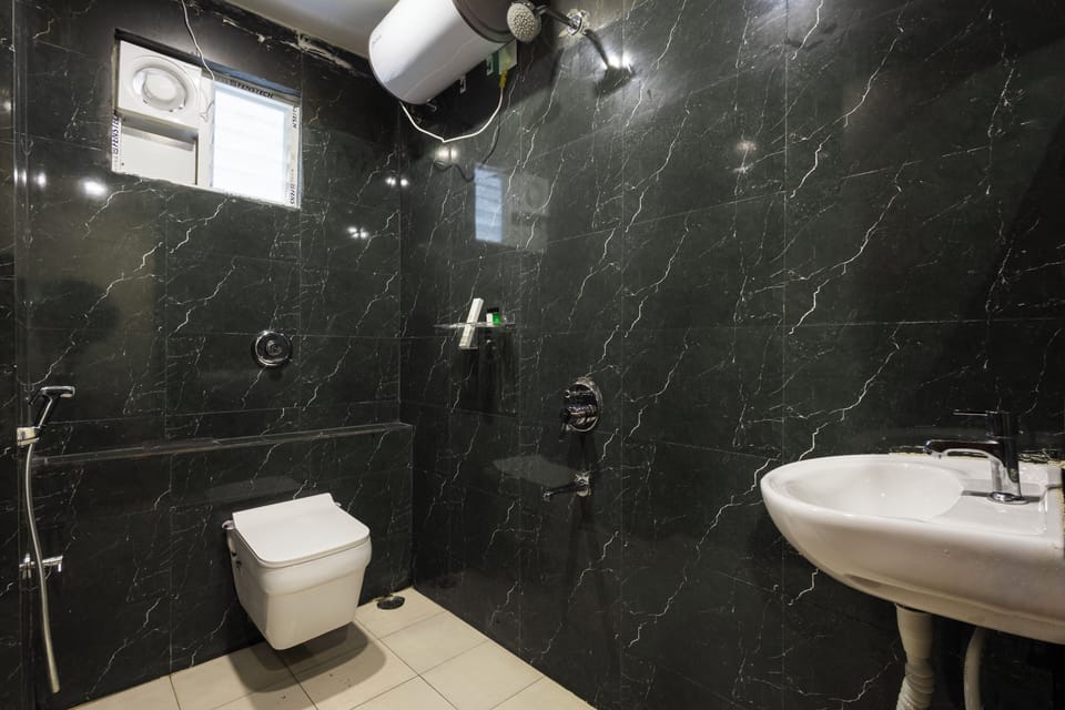 Shower, slippers, bidet, towels