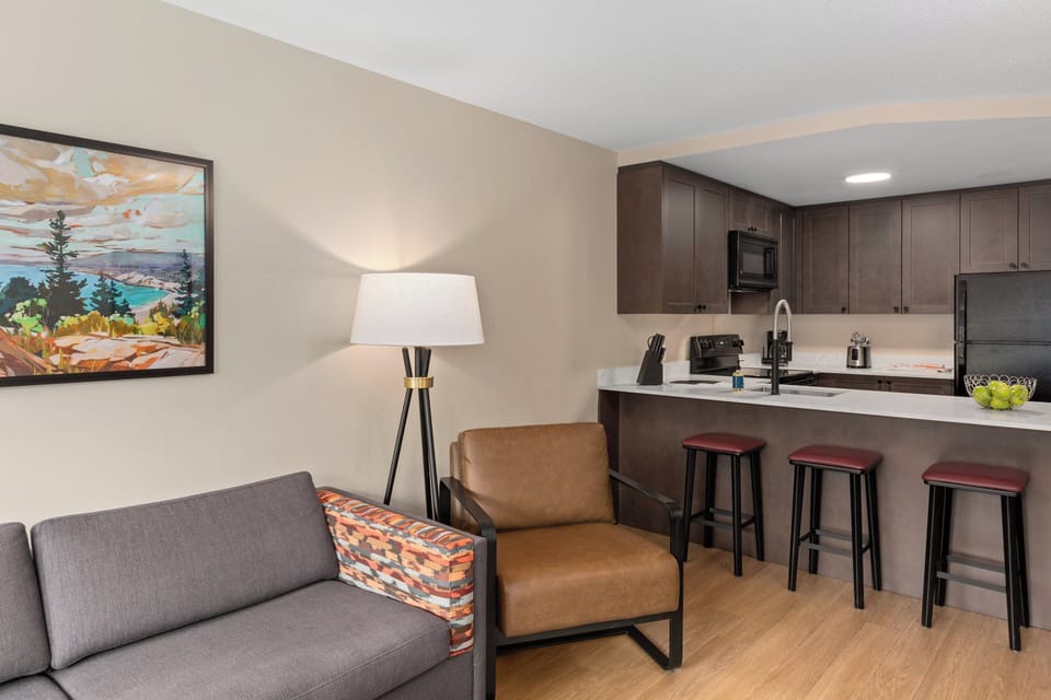 Condo, 1 Bedroom | Living area | 32-inch TV with cable channels, fireplace, DVD player