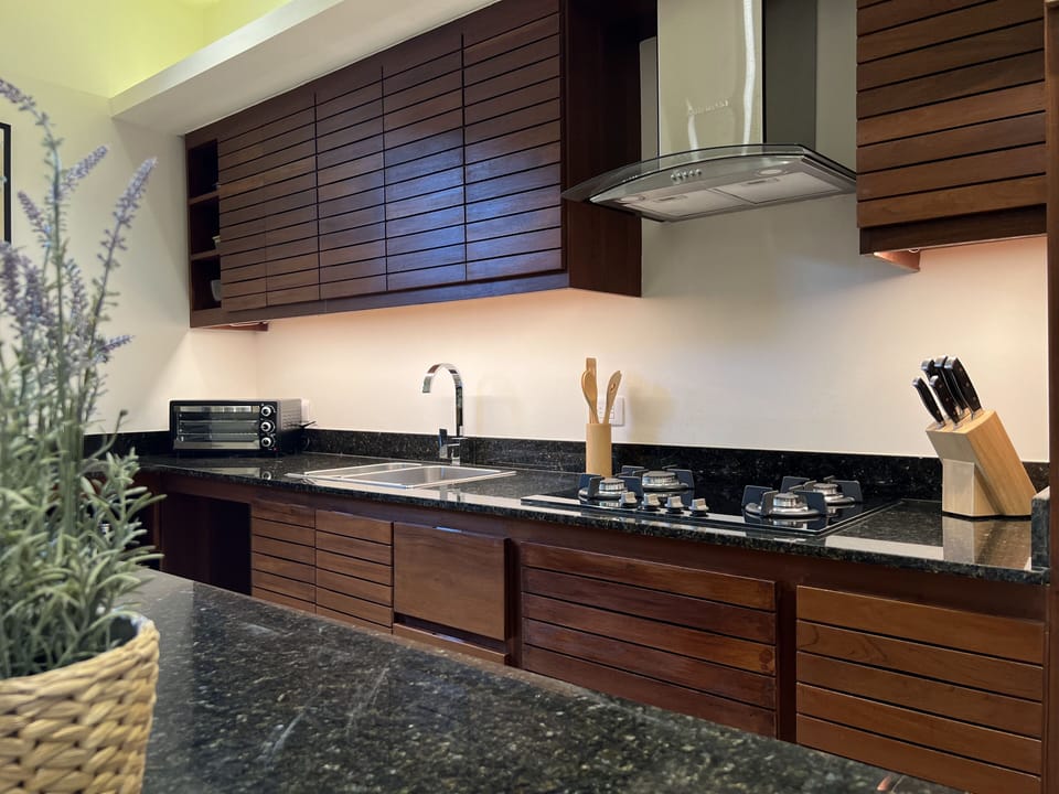 Superior Suite, 2 Bedrooms, Kitchen, Pool View | Private kitchen