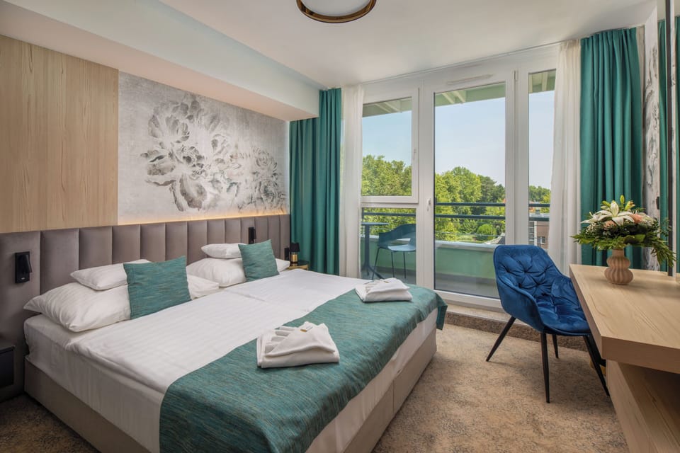 Standard Double Room, Balcony | Minibar, in-room safe, desk, free WiFi