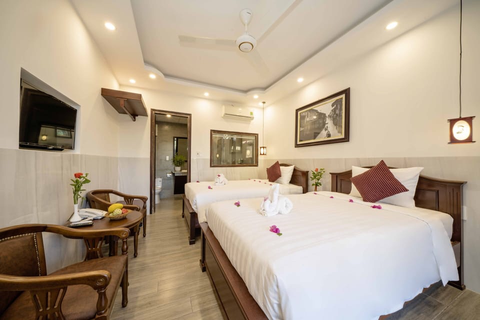Family Room, 2 Bedrooms | Minibar, desk, soundproofing, iron/ironing board